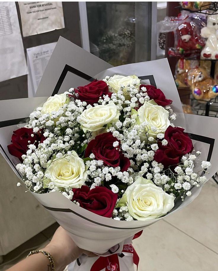 Ivory Grace white and burgundy carnation bouquet with Nilgiri eucalyptus