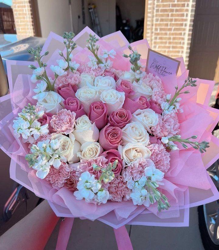Orchid Opulence pink orchids with cream chrysanthemums and blush roses in Ooty