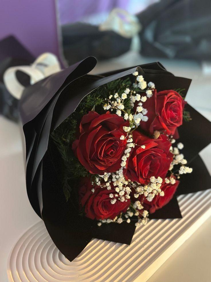 Vintage Noir ruby red roses in minimalist chic black paper Ooty